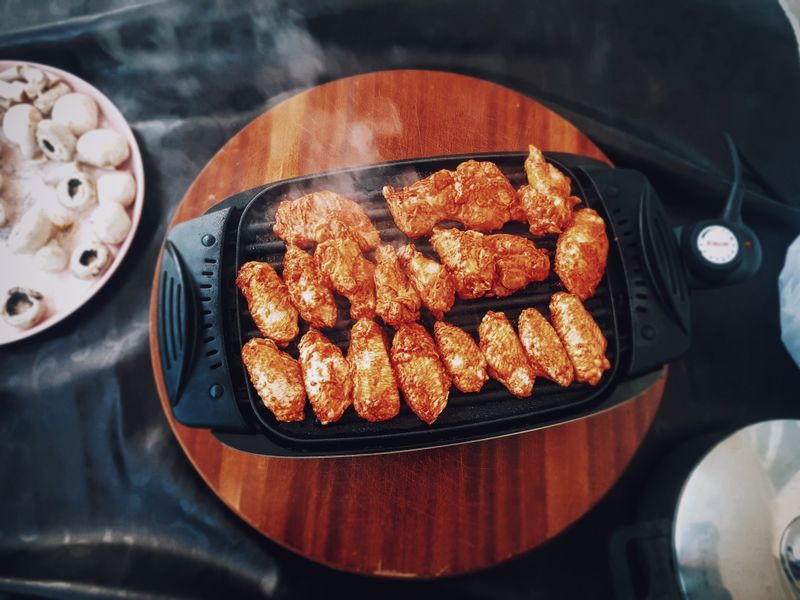 Korean fire boneless wings over gochujang glaze